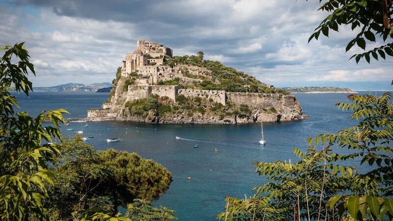 Castle on Rocky Island — Blue, Dramatic, Afternoon, Photograph, Sea
