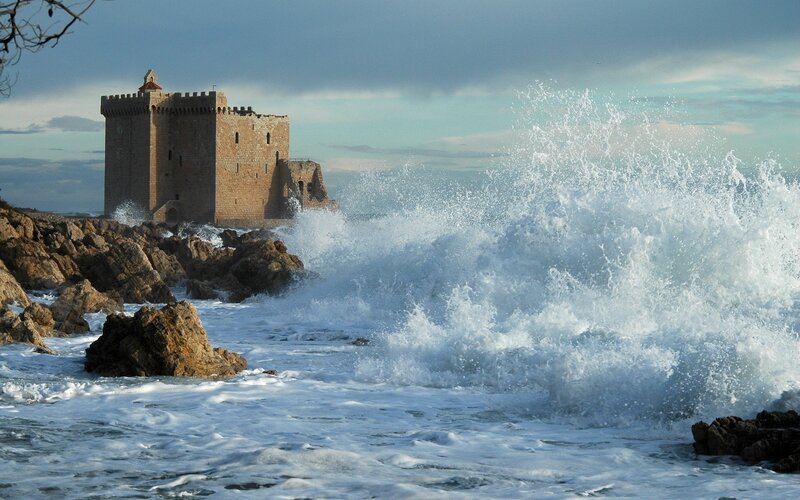 Castle on Rocky Shore — Blue, Dramatic, Afternoon, Photograph