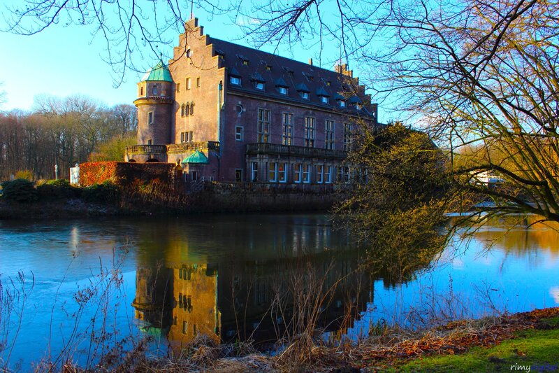 Castle reflected in a calm lake