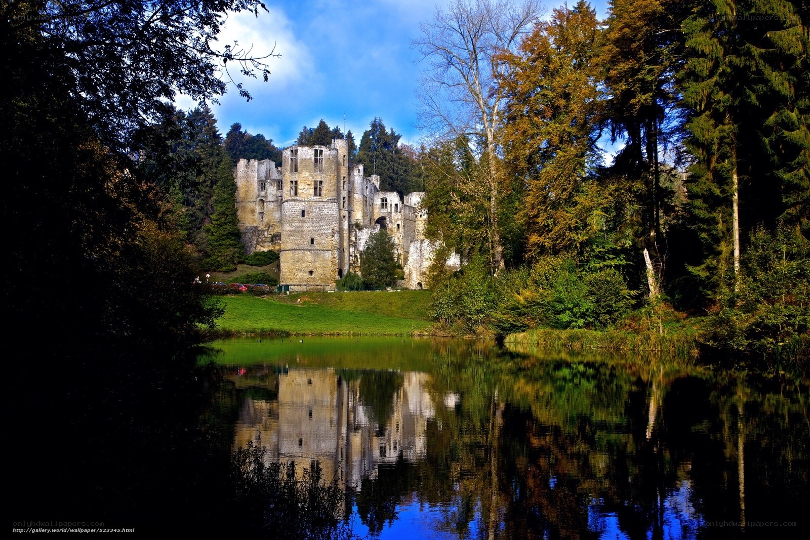 castle reflected in a lake