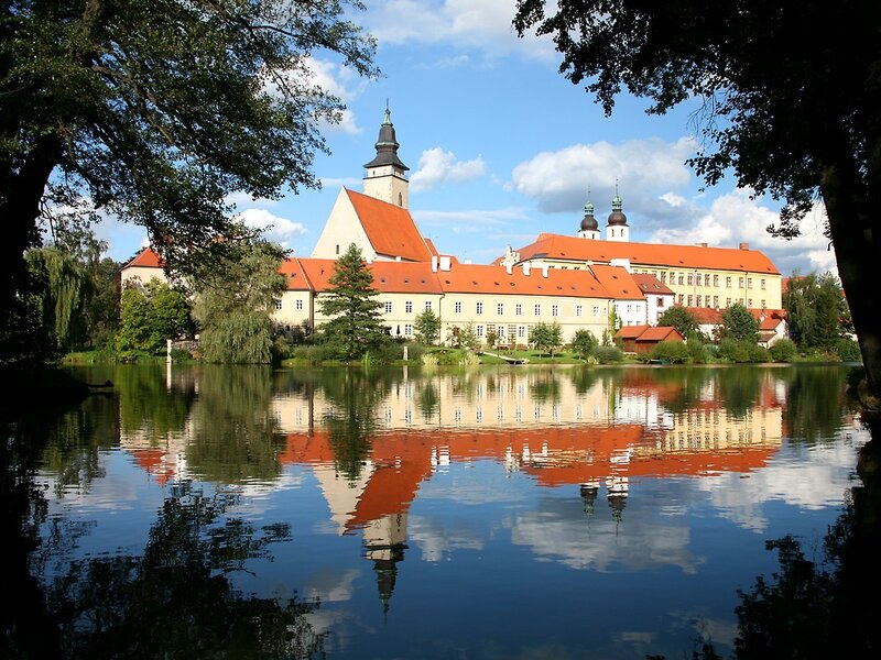 castle reflected in a lake
