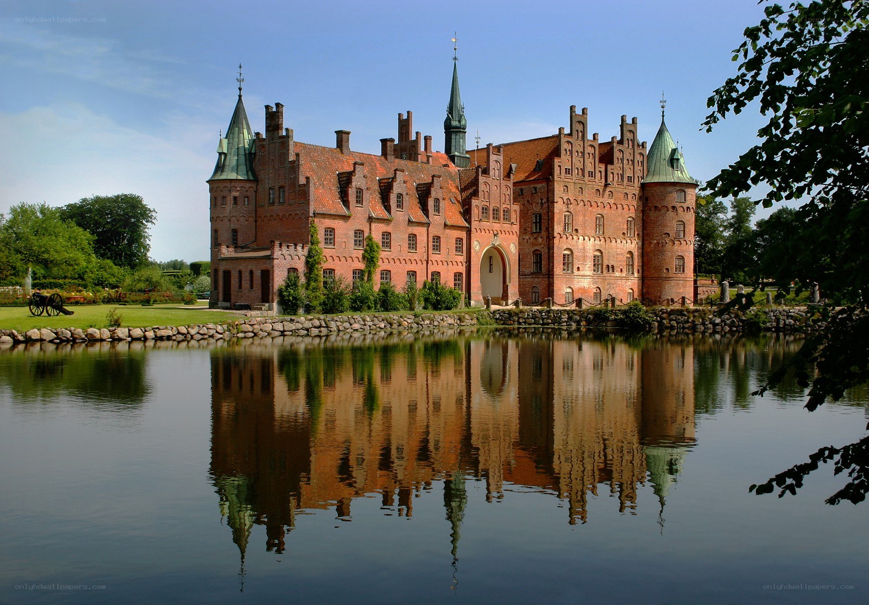 castle reflected in a moat