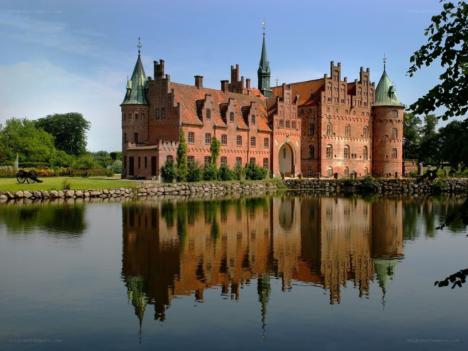 castle reflected in a moat