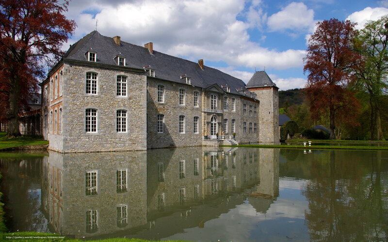 castle reflected in a pond