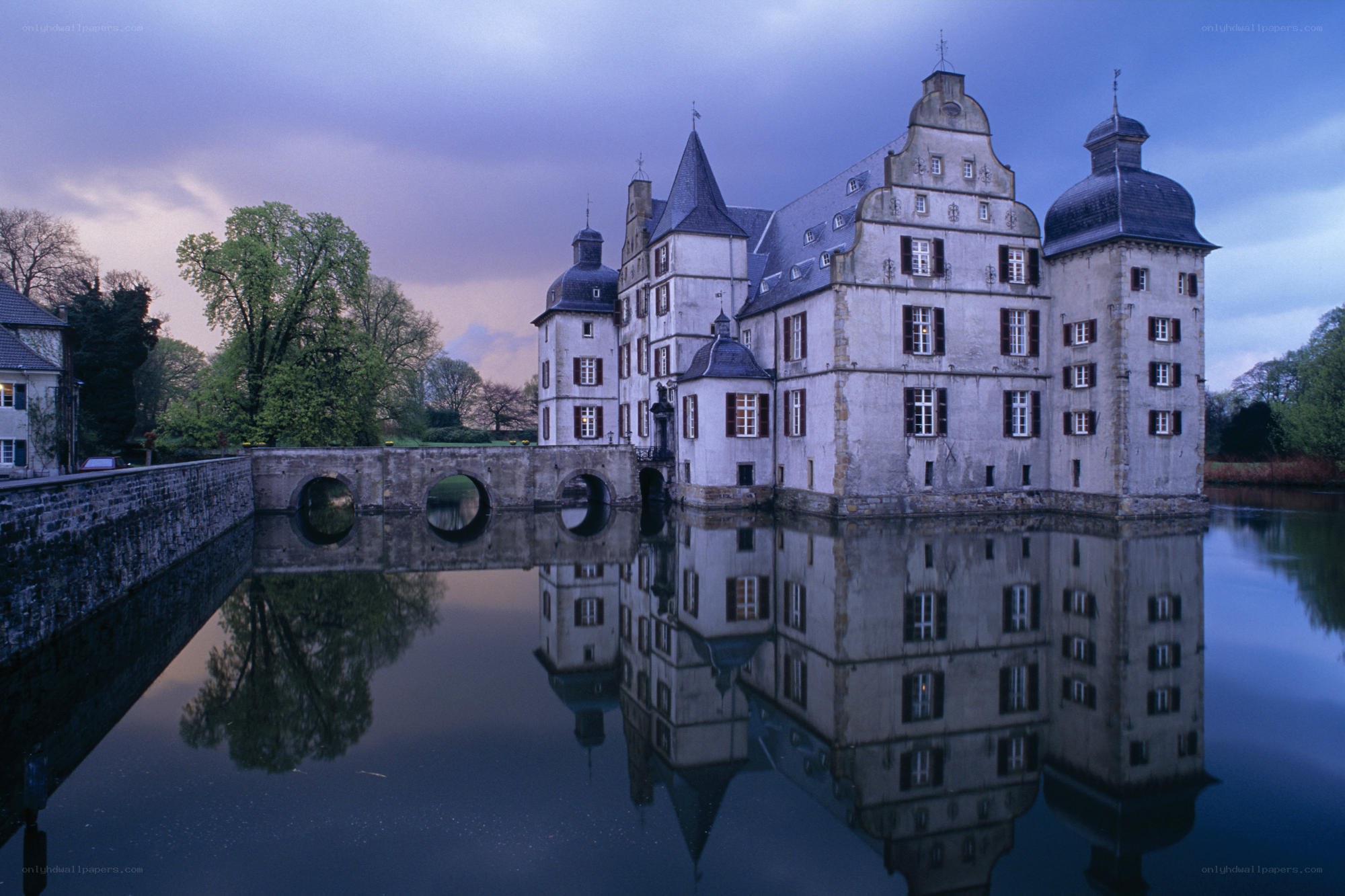 Castle reflected in calm water