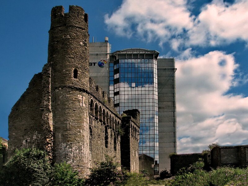 Castle Ruins and Modern Building