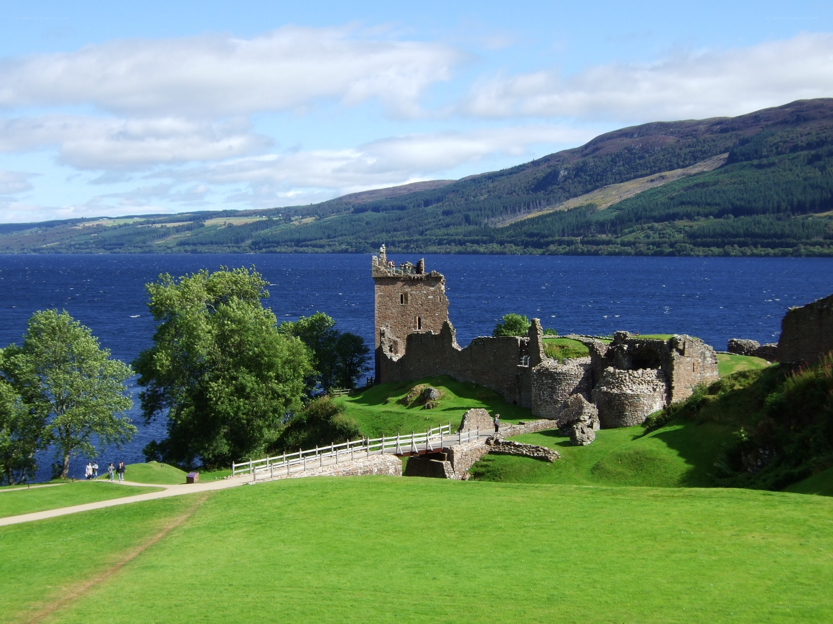 Castle ruins by a lake