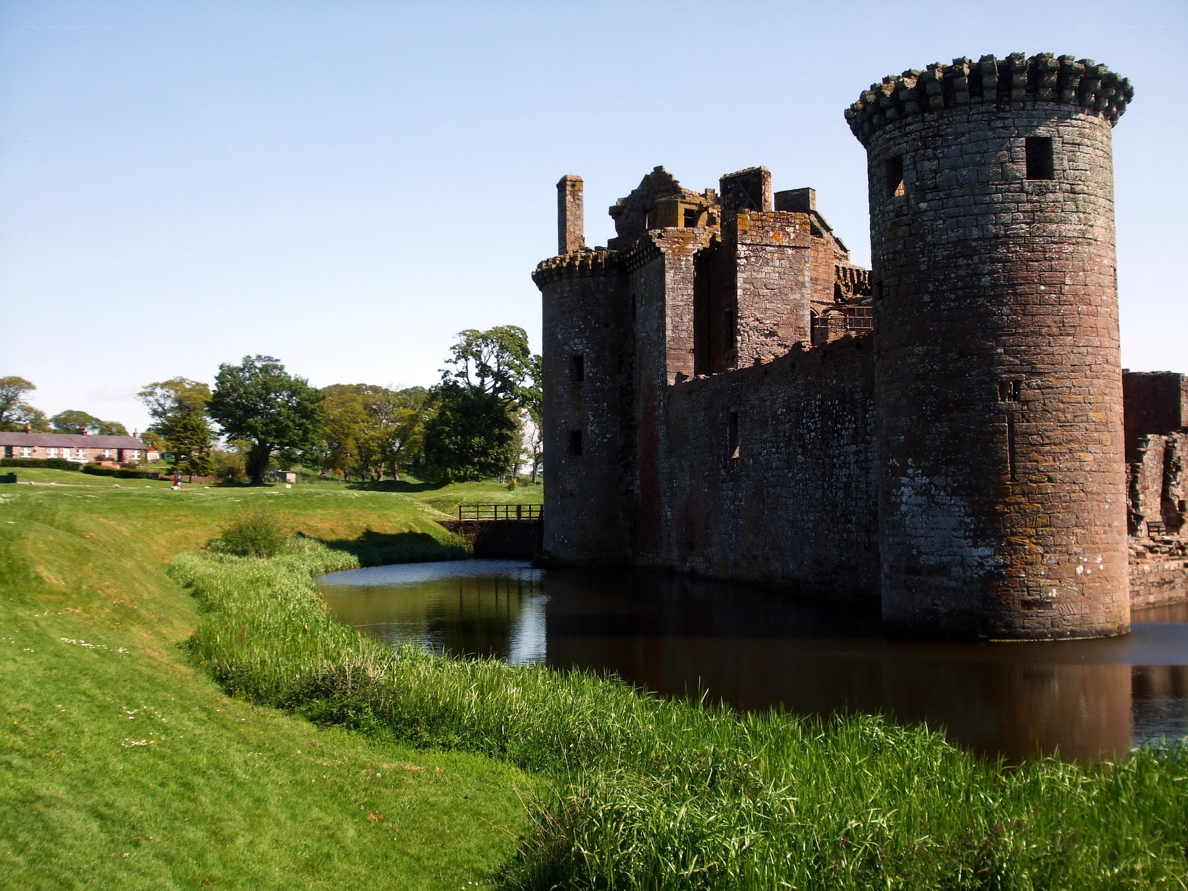 Castle ruins by a moat