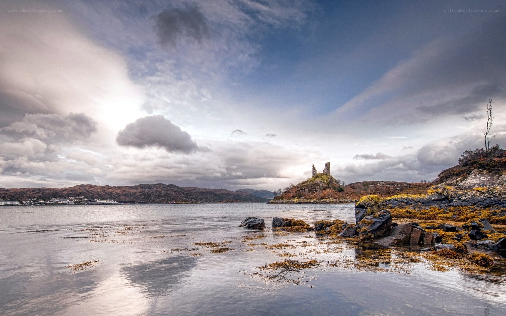 Castle ruins on a coastal hill