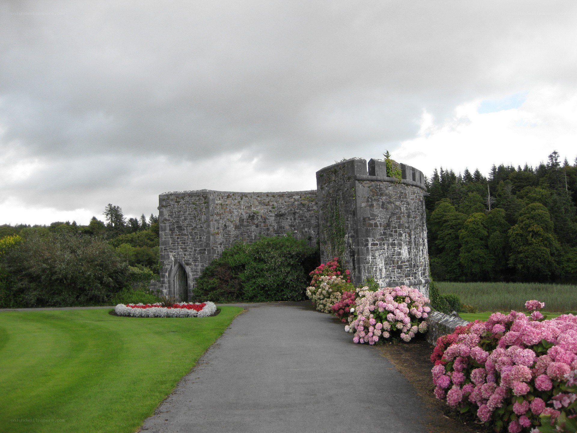 castle ruins with flower beds