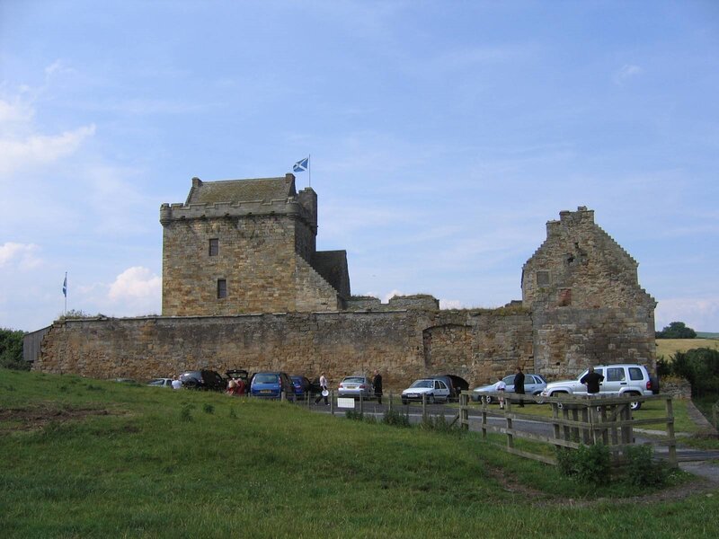 Castle ruins with Scottish flag