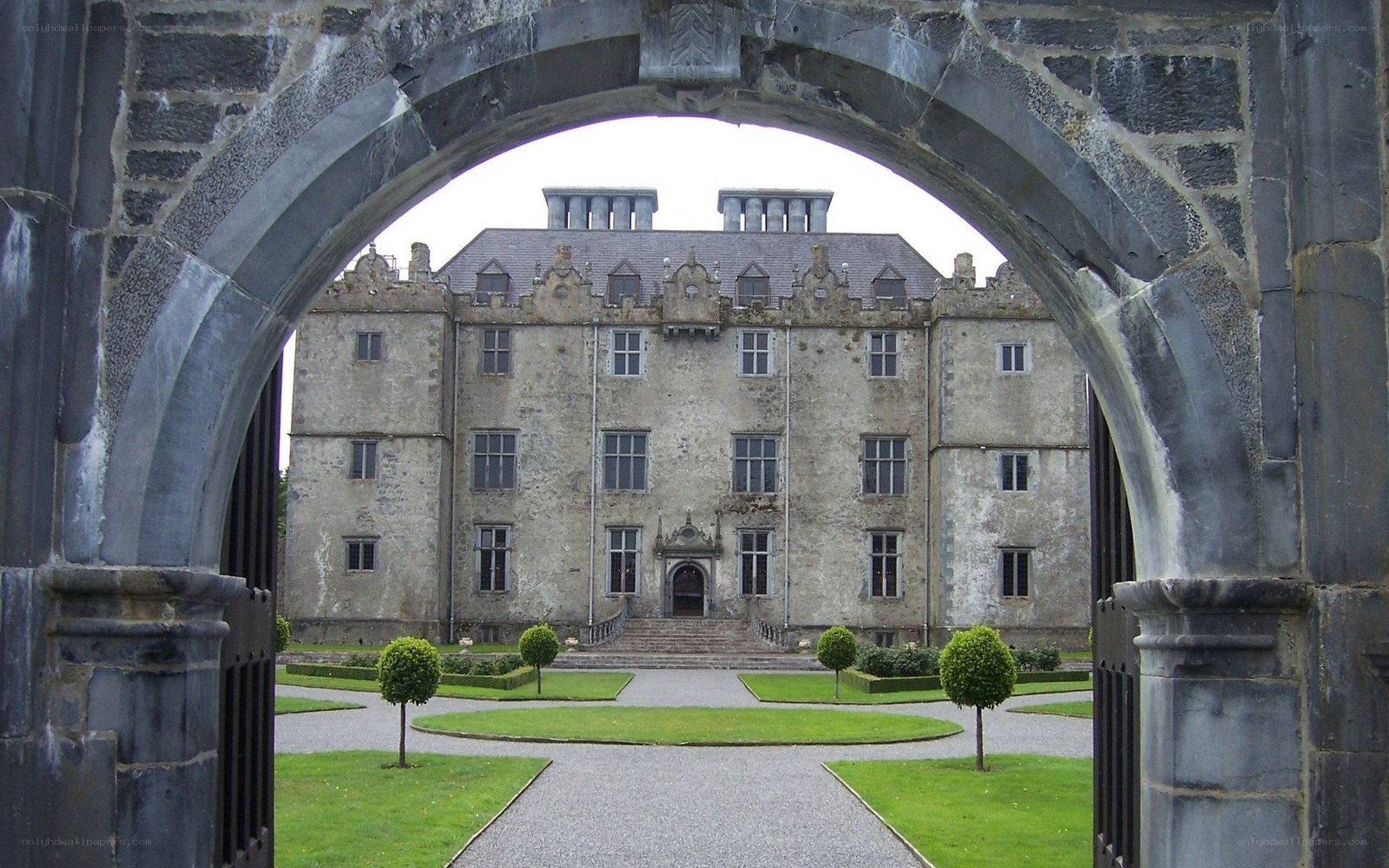 Castle through stone archway