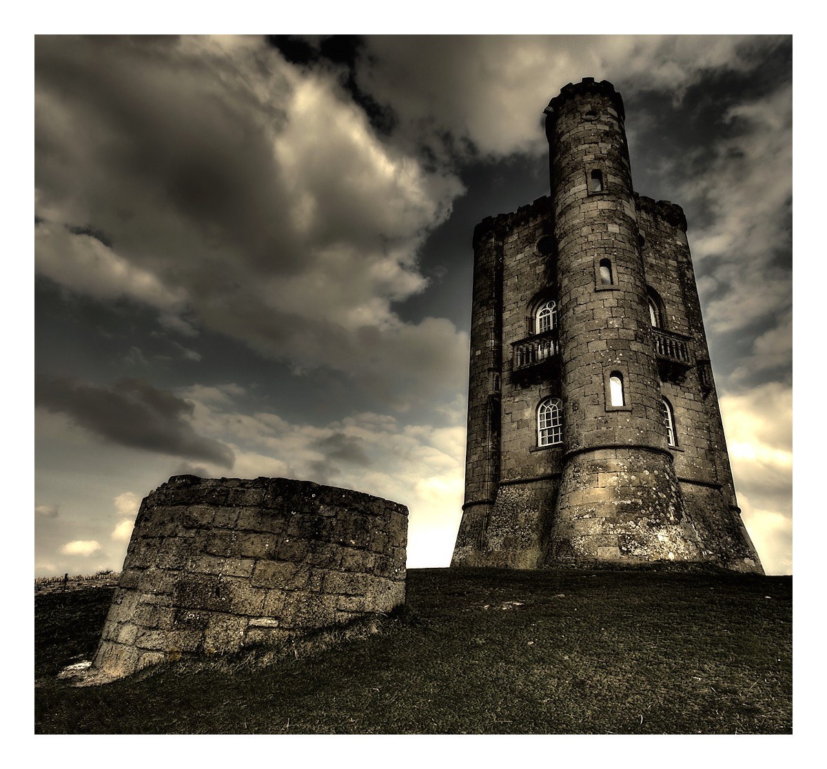 Castle tower under stormy sky