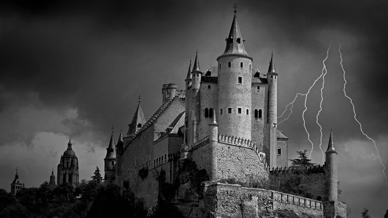 Castle under stormy sky