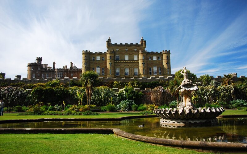 Castle with fountain and gardens