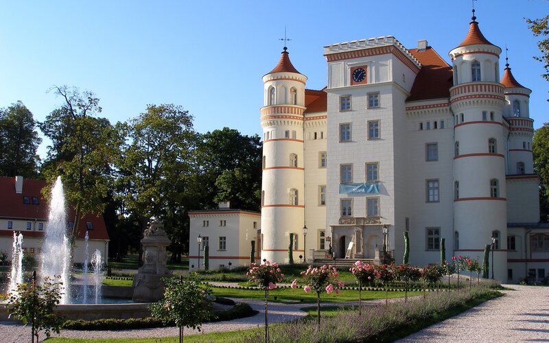 castle with fountain and gardens