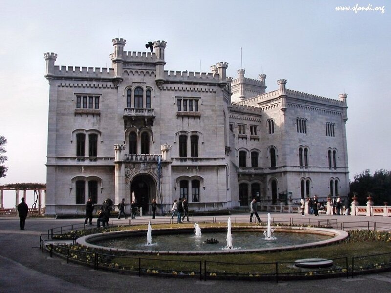 castle with fountain in foreground