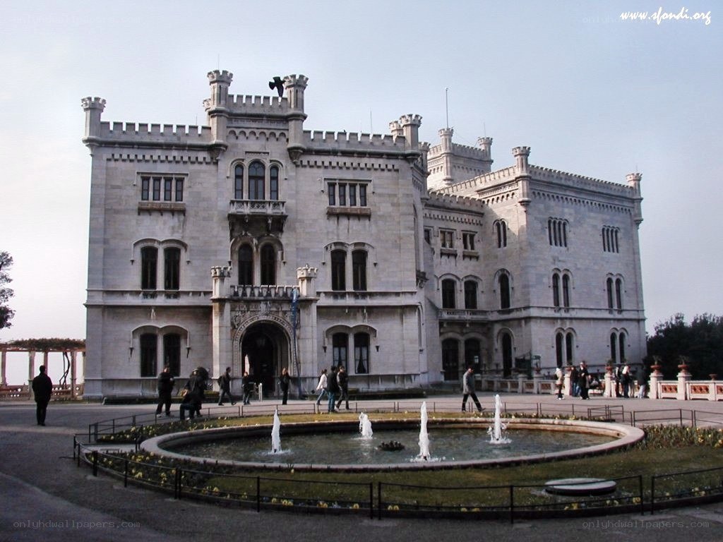 castle with fountain in foreground