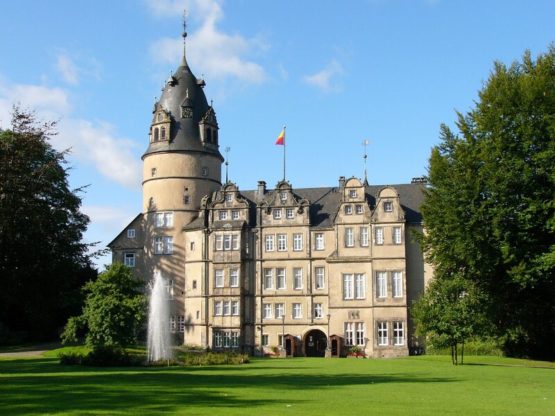 Castle with fountain in garden