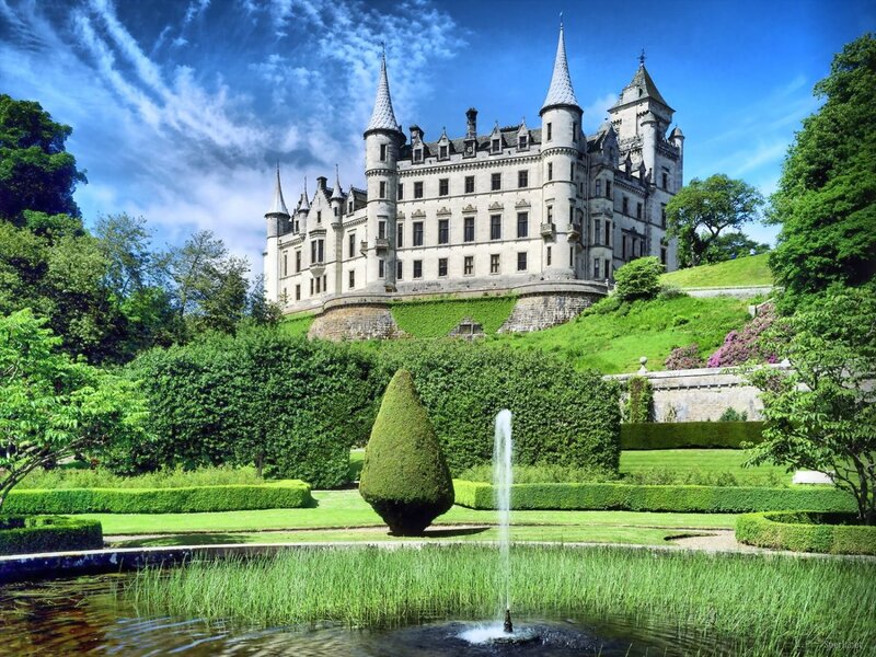 Castle with fountain in garden