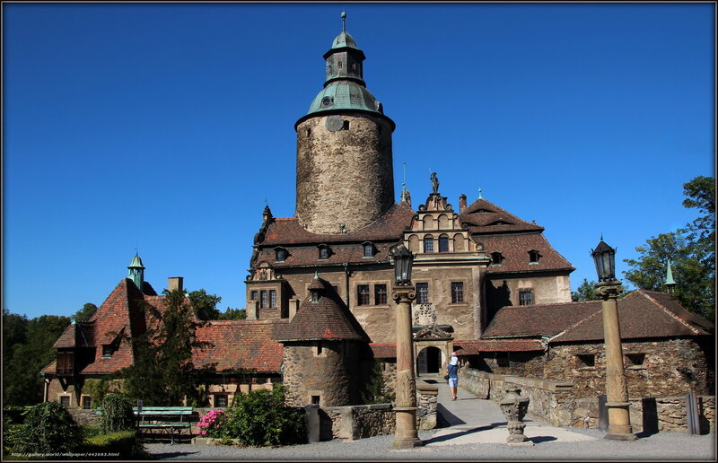 castle with green-roofed tower