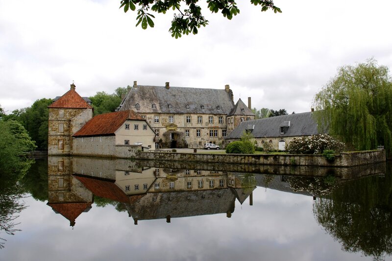 castle with moat reflection