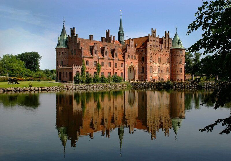 Castle with moat reflection