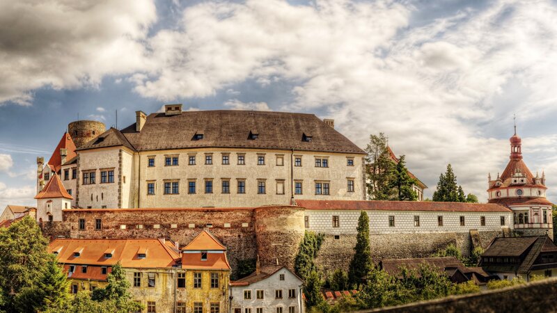 Castle with Red-roofed Buildings — White, Dramatic