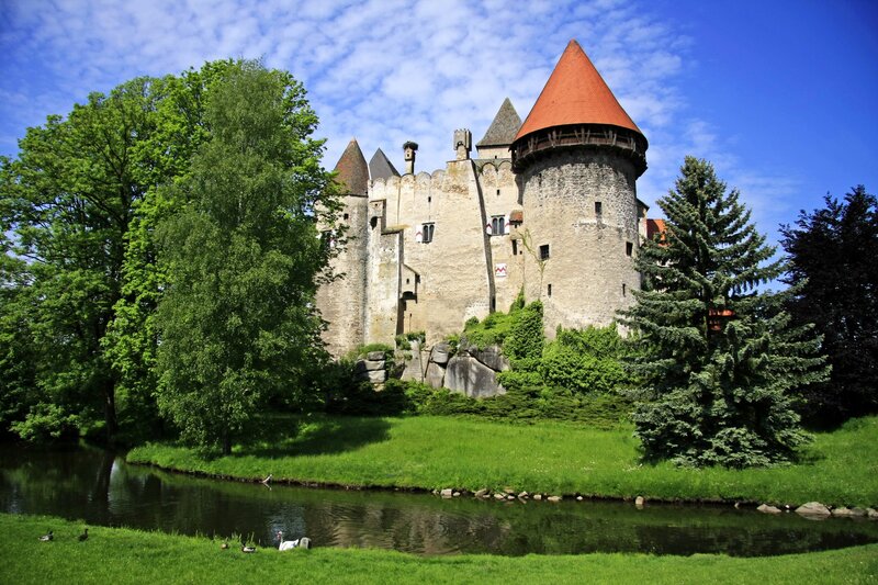 castle with red-roofed tower