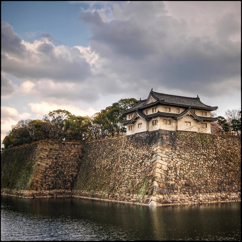 castle with stone walls and moat