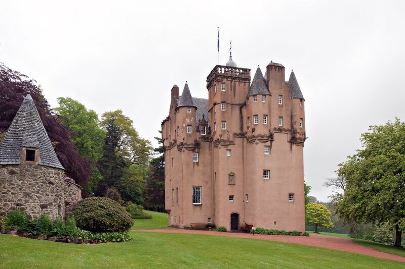 Castle with turrets and green grounds