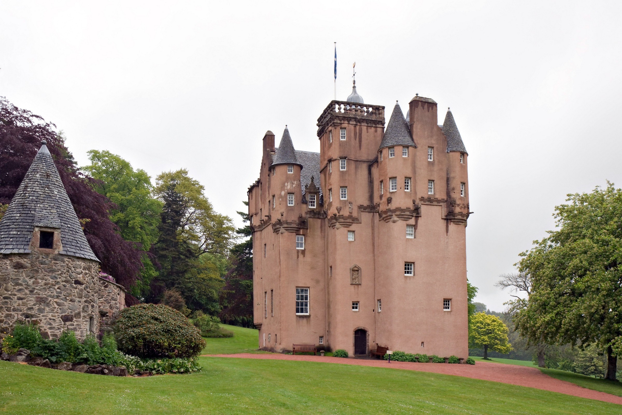 Castle with turrets and green grounds