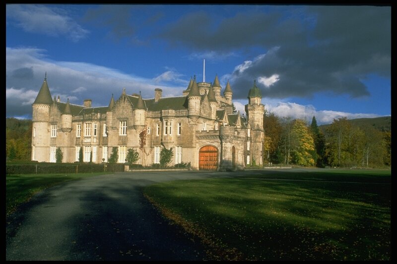 Castle with turrets and green lawn