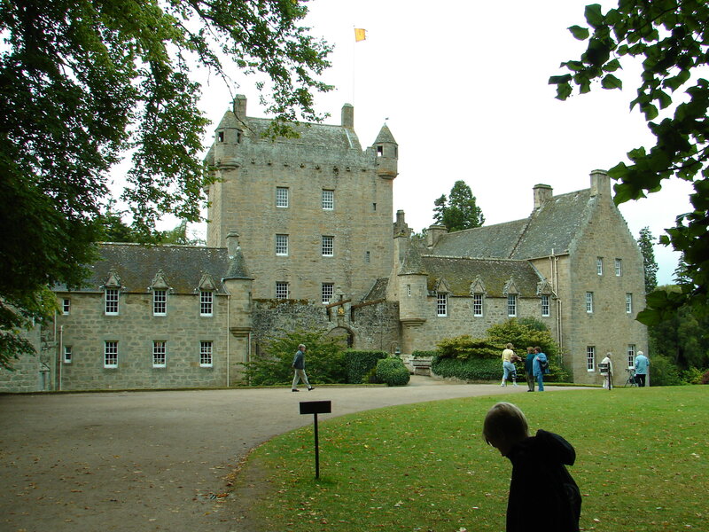 Castle with visitors in Scotland