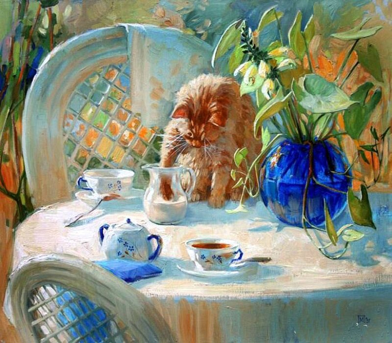 Cat at a tea table