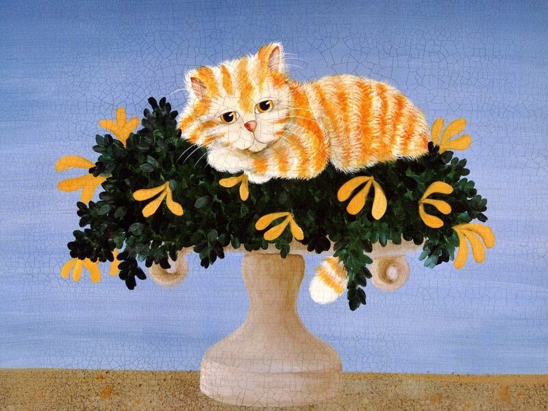 Cat in a flower arrangement