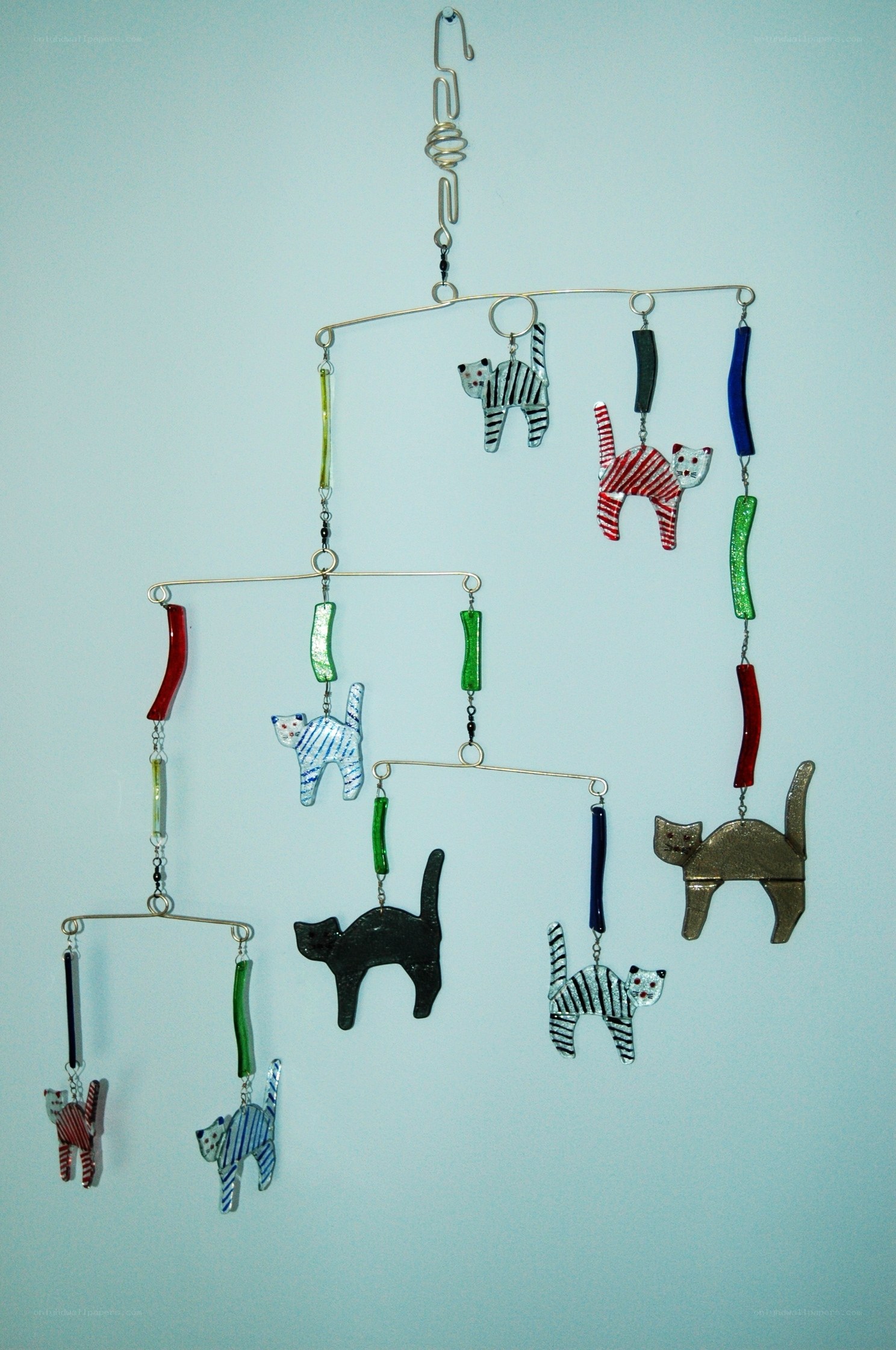 Cat-themed mobile with colorful figures