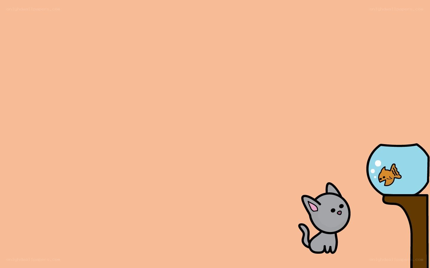 cat watching fish in bowl