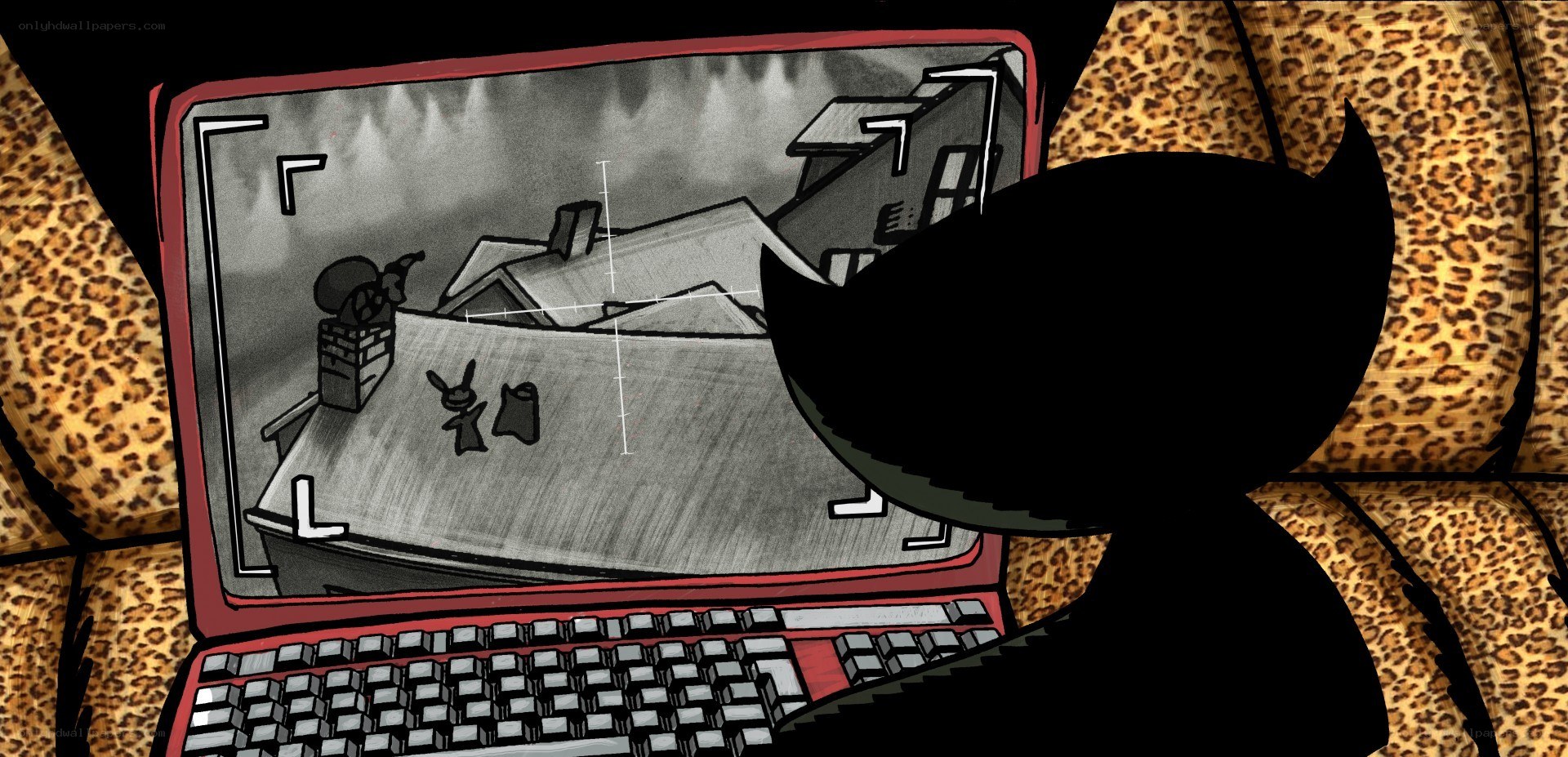 cat watching game on laptop