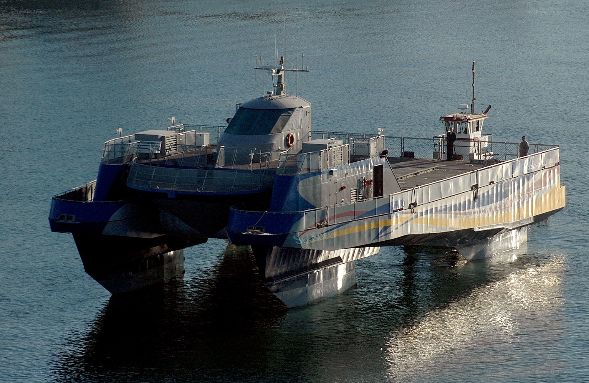 catamaran ferry on calm water