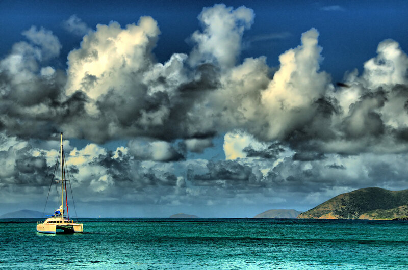 Catamaran under stormy sky