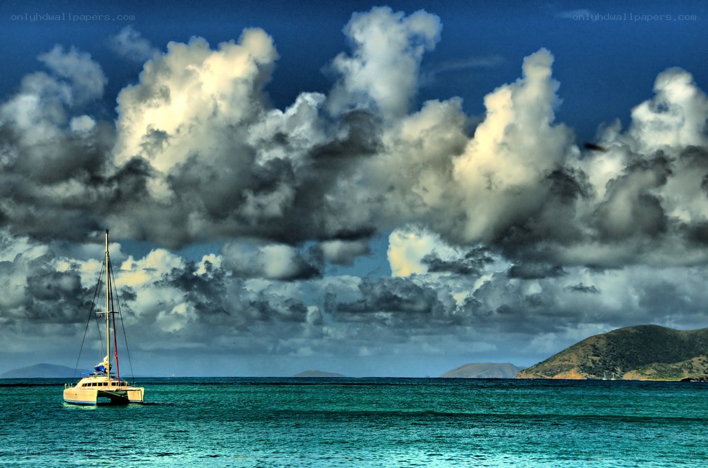 Catamaran under stormy sky