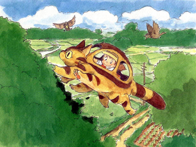 Catbus flying over green fields