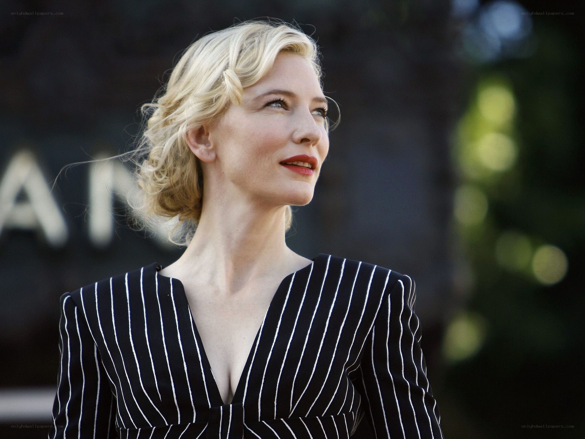 Cate Blanchett in pinstripe suit