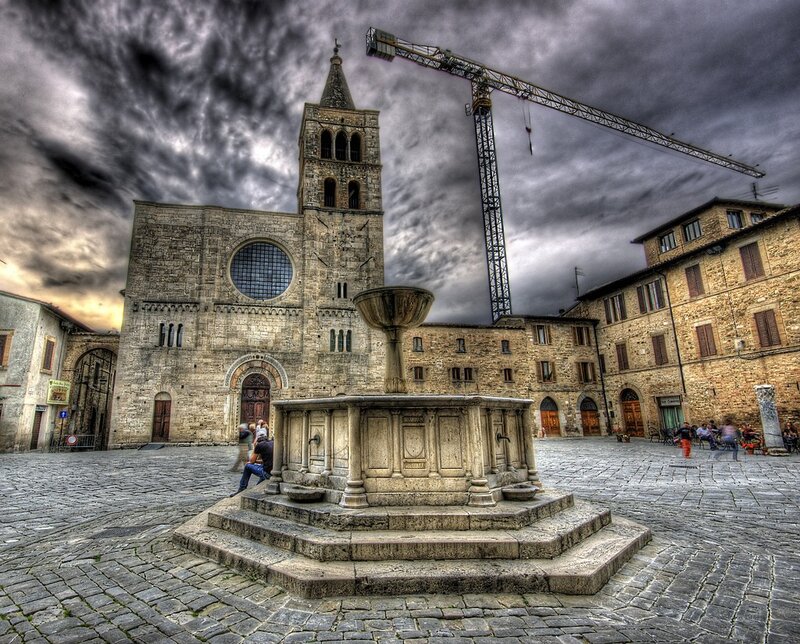 Cathedral and fountain in Italian square