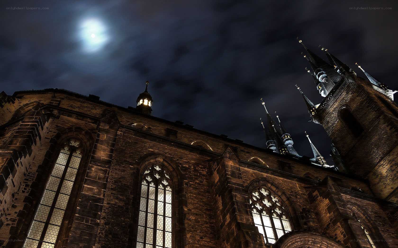 Cathedral at night under moonlight