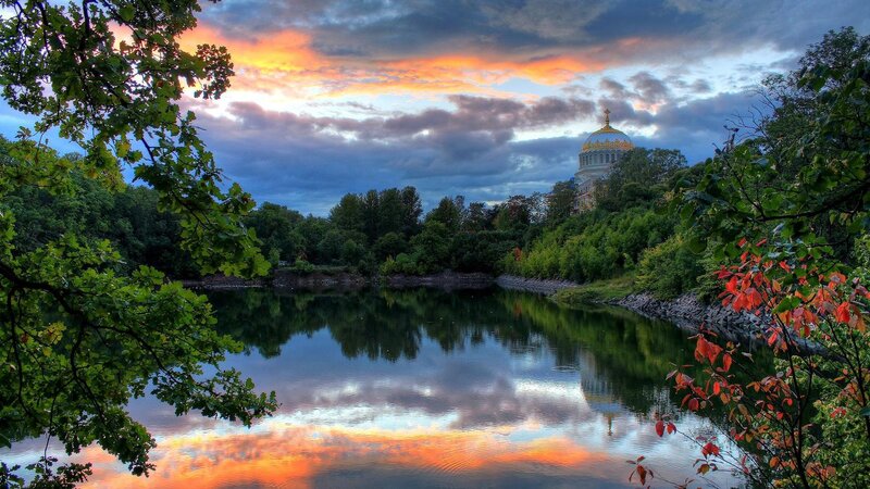 Cathedral by River at Sunset — Orange, Serene