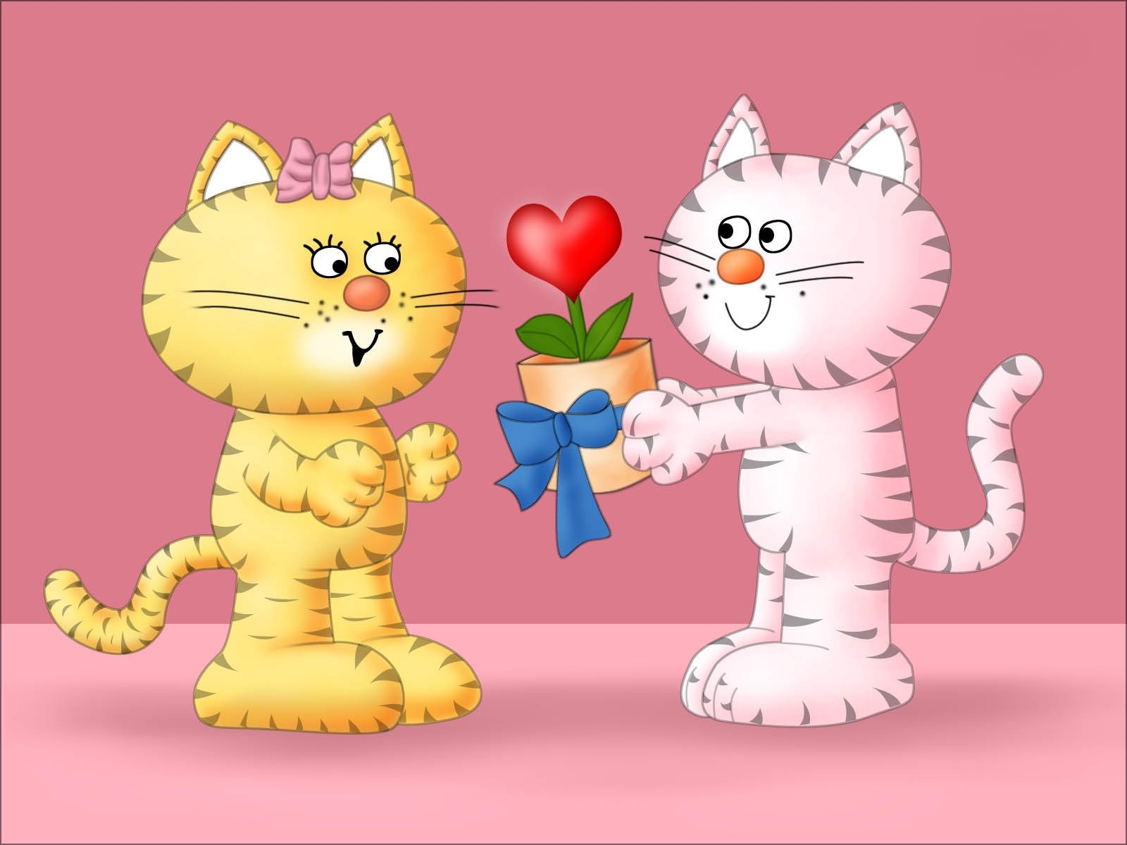Cats exchanging a heart gift