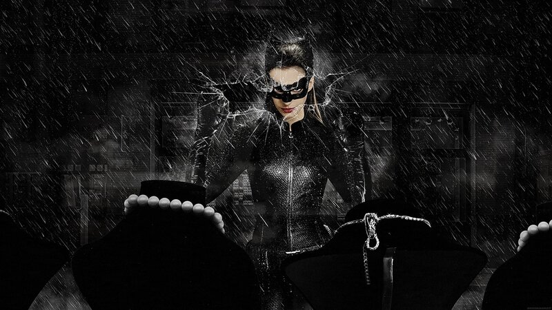 Catwoman breaking glass in rain