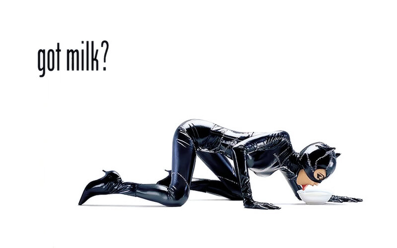 Catwoman drinking milk